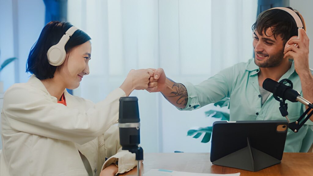 Corporate representatives showcasing their brand at the Cyprus Digital Marketing Summit sponsorship booth.