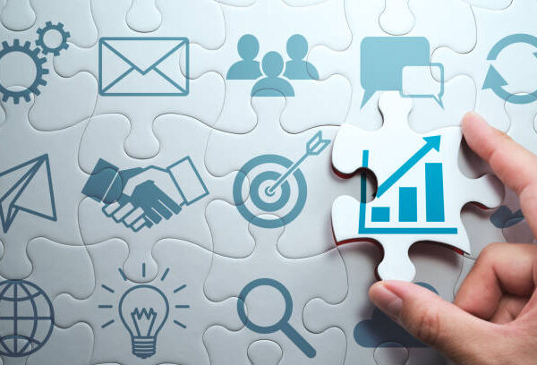 Connecting last jigsaw puzzle piece.