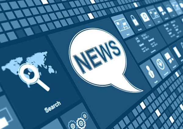 Conceptual image representing mosaic media interface and the digital software. A wall of screens curves away from view, shimmering with an assortment of random graphics, animations and simple icon images.