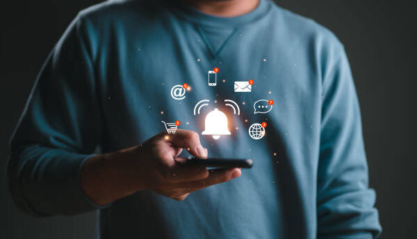 Business people using smartphone with virtual bell ringing for application notification alert concept, New email, digital marketing, electronic message alert.