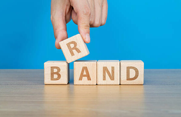 Wooden blocks with word brand.