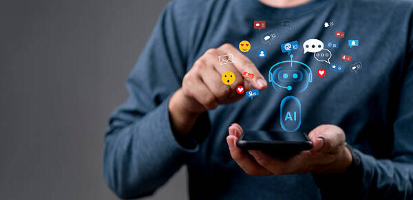 AI chatbot technology social media marketing. Hand holding smartphone, customer service automation. Digital engagement, notification, comment, like. Communication, CRM concept.