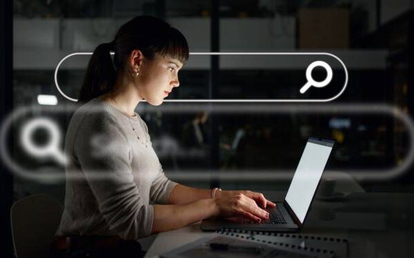 Night, overlay or woman typing to research web design on internet, website or online on laptop in office. Digital, iot or employee reading SEO information in overtime in dark workplace for big data